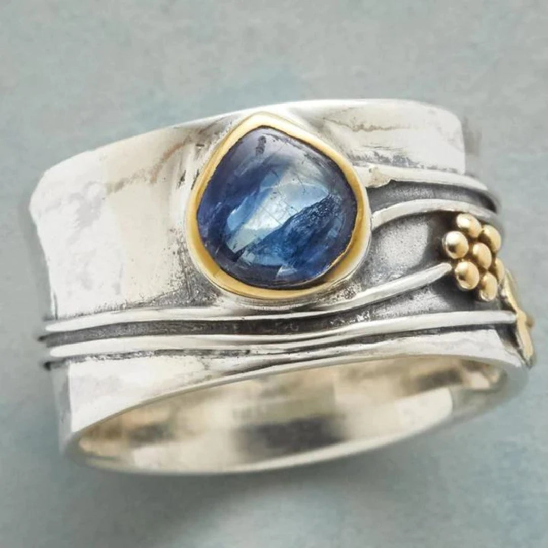 Bague vintage avec pierre bleue