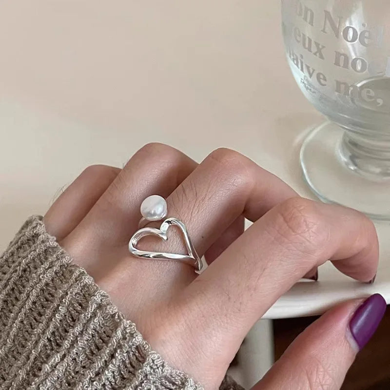 Bague en argent avec perles en forme de cœur