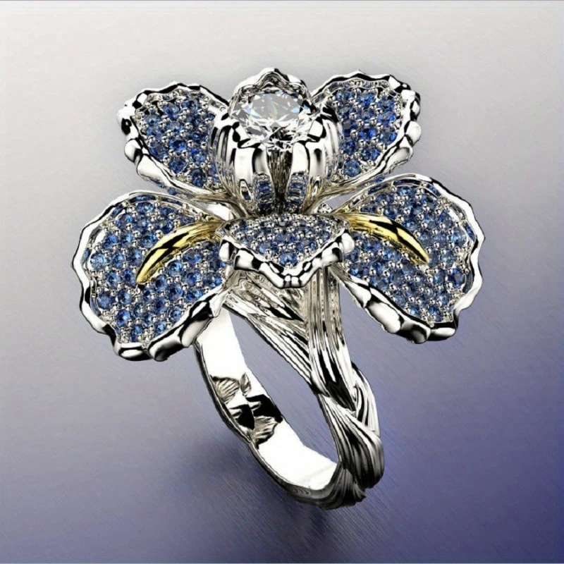 Bague en argent avec fleur bleue et cristal