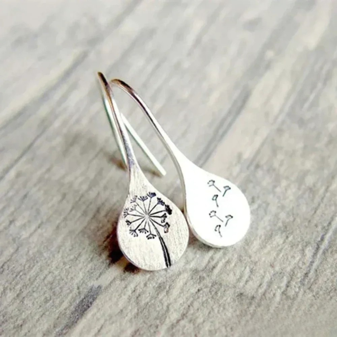Boucles d'oreilles en argent finement travaillées en forme de feuille de pissenlit