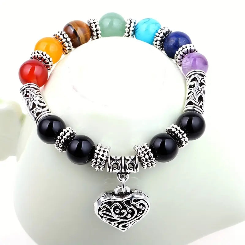 Le bracelet 7 Chakras avec pendentif en forme de cœur