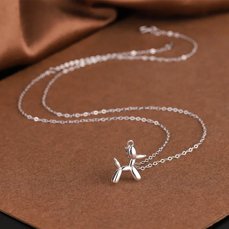 JUNO – Collier avec pendentif en forme de chien en ballon en argent et or