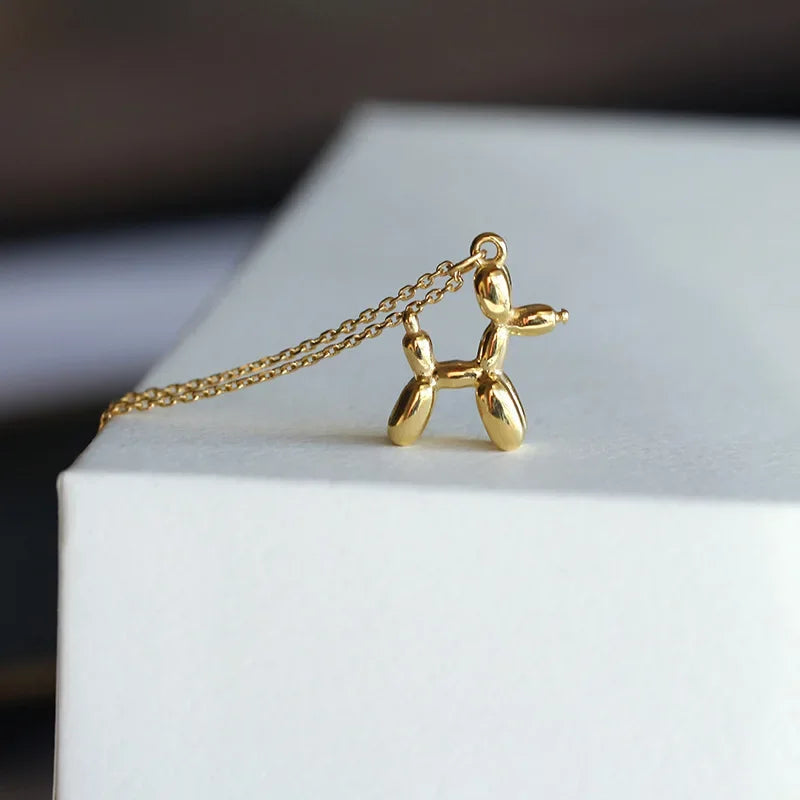 JUNO – Collier avec pendentif en forme de chien en ballon en argent et or