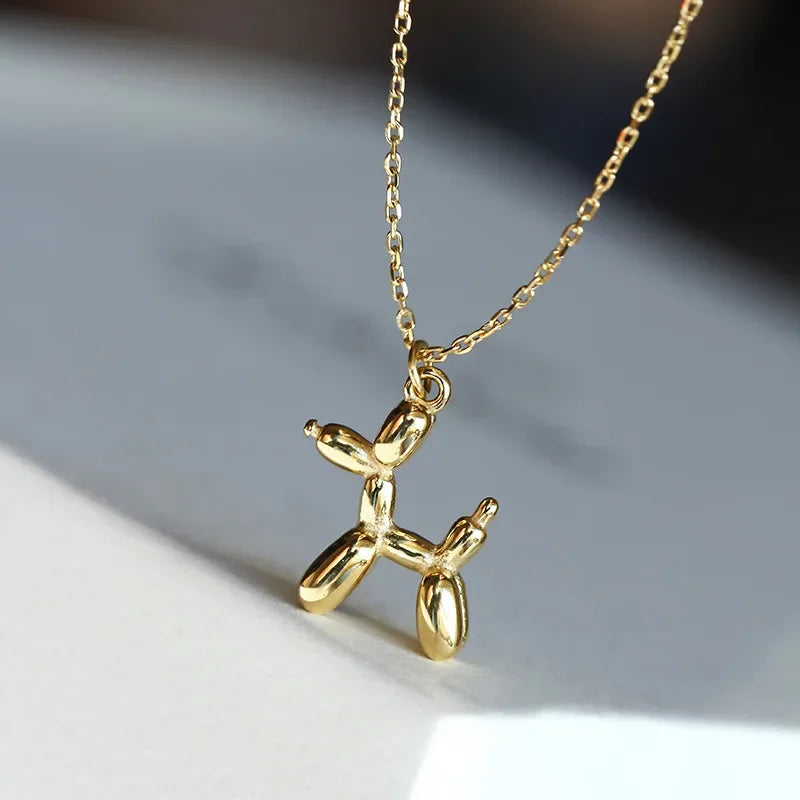 JUNO – Collier avec pendentif en forme de chien en ballon en argent et or