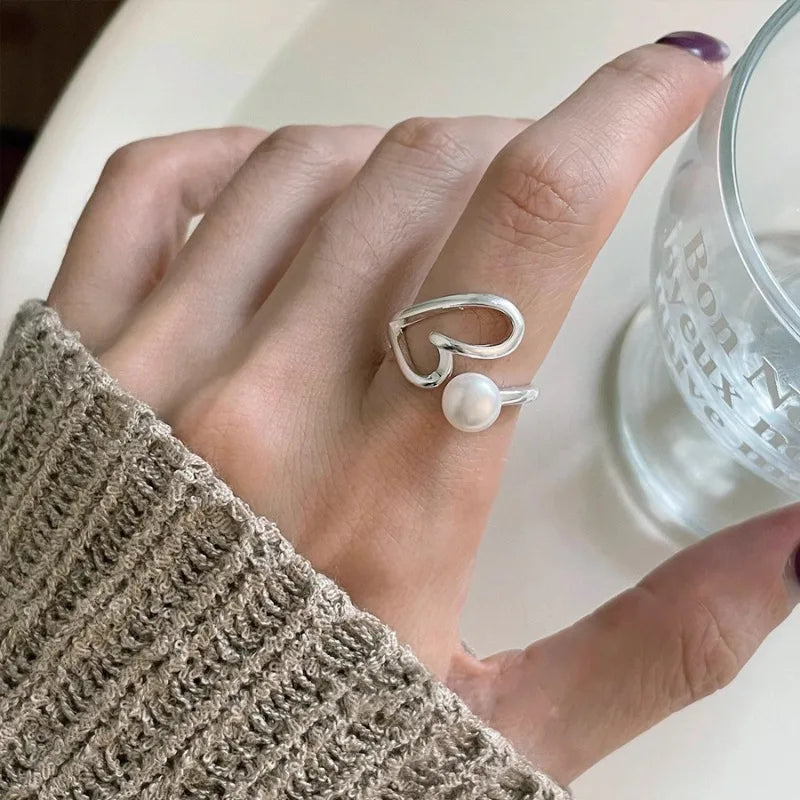 Bague en argent avec perles en forme de cœur