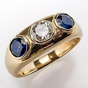 Bague en or avec zircon et cristal bleu