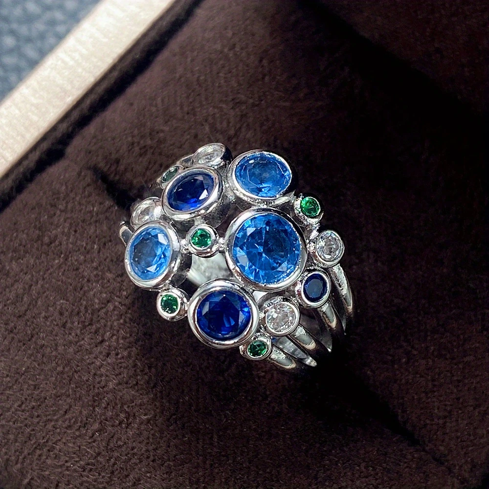Bague en argent avec des bulles vertes et bleues